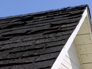 shingles bent from storm damage